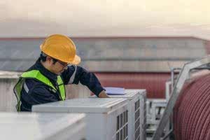 Engineers is checking the air conditioning cooling system of a major building or industrial facility.